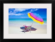 Beach Chair And Umbrella With Snorkel Gear, Turquoise Ocean And Blue Skies