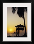 Mexico, Ixtapa Coast, Beach Bungalow And Palm Tree Silhouette At Sunset