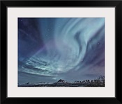 Northern Lights (aurora borealis) over the Talkeetna Mountains on a clear evening