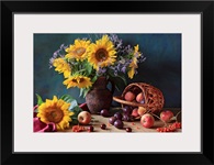 Summer still life with sunflowers, apples, peaches, plums, rowan berries and cherries