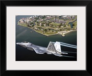 A F/A 22 Raptor flies over Fort Monroe