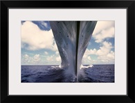 A waterlevel bow view of the battleship USS Missouri