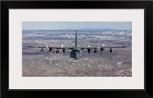 An MC-130 aircraft manuevers during a training mission over New Mexico