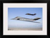 Two F-117 Nighthawk stealth fighters in flight over New Mexico