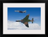 Two QF-4Es fly over the Gulf of Mexico