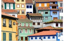 Painted houses like a puzzle in Cudillero, Spain.
