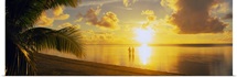 Silhouette of a couple standing on the beach, Aitutaki, Cook Islands, French Polynesia