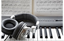 Headphones on electronic piano keyboard