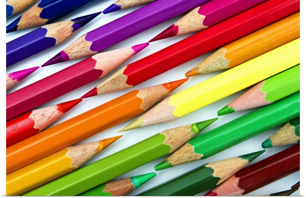 Poster Print Wall Art entitled Rainbow colored pencils arranged tip to ...