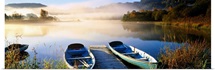 Rowboats at the lakeside, English Lake District, Grasmere, Cumbria, England