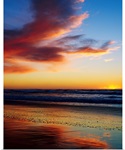 Sunset And Clouds Over Pacific Ocean
