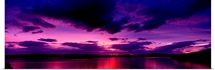 Sunset over an island viewed from Applecross Peninsula Isle of Skye Inner Hebrides Hebrides Scotland