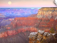 Full moon over the Grand Canyon at sunset as seen from Pima Point Arizona
