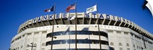 Flags in front of a stadium, Yankee Stadium, New York City, New York