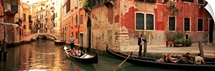 Tourists in a gondola, Venice, Italy