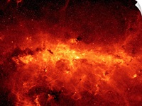 The Milky Way center aglow with dust