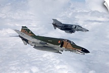 Two QF-4Es fly over the Gulf of Mexico