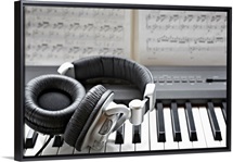 Headphones on electronic piano keyboard