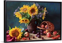 Summer still life with sunflowers, apples, peaches, plums, rowan berries and cherries