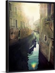 Two gondolas floating in water surrounded by old buildings.