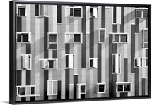 Windows in modern building with unusual distribution.