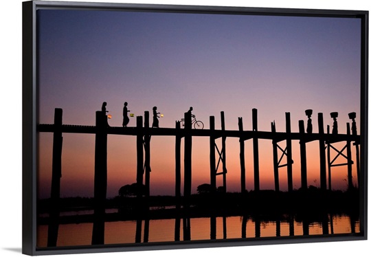 People walking on Ubein Bridge at Sunset, Mandalay, Burma