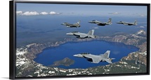 A five-ship aircraft formation flies over Crater Lake, Oregon
