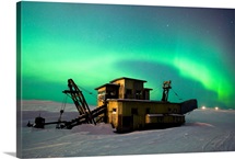 Green Northern Lights Dance Over A Historical Gold Dredge Near Nome, Alaska