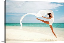 Hawaii, Oahu, Lanikai Beach, Ballet Dancer Leaping Into Air With White Flowing Fabric
