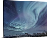 Northern Lights (aurora borealis) over the Talkeetna Mountains on a clear evening