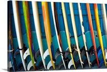 Row Of Surfboards Lined Up Against A Wall