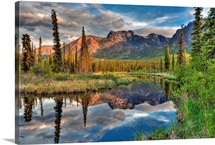 Skookum Volcano reflecting in a pond along the Nabesna Road in Wrangell-St. Elias