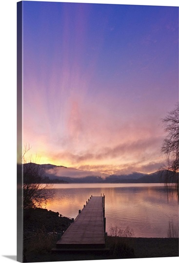 Sunrise over a dock in Lake Whatcom during Winter Bellingham Washington