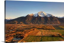 Sunset on Pioneer Peak and farm fields near Palmer, Alaska during Autumn
