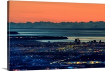 The city of Anchorage Alaska at sunset with Cook Inlet in the background