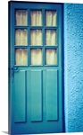 Blue door with blue wall.