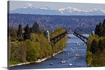 Boats passing under Montlake drawbridge between lake Washington and lake Union.