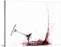 Falling glass of red wine