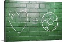 Love = Football drawn in chalk on wall.