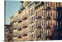 Lower east side cityscape of building fire escape stairs and windows, New York.