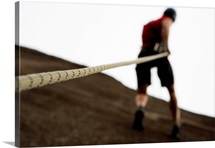 Man rock climbing with rope