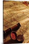 Map with spyglass and compass