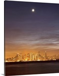 Moon setting over San Francisco on hazy December evening, taken from Treasure Island.