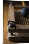 Racket in vice with ball