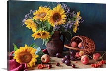 Summer still life with sunflowers, apples, peaches, plums, rowan berries and cherries