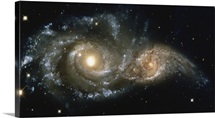 These two spiral galaxies were seen near the constellation Canis Major.