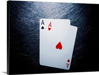 Two Aces Playing Cards on Stainless Steel.