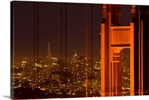 USA, California, San Francisco, Golden Gate Bridge, north tower with cityscape, night