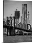 View of One World Trade Center and brooklyn bridge in New York city skyline.
