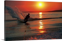 Waterskiing at sunset